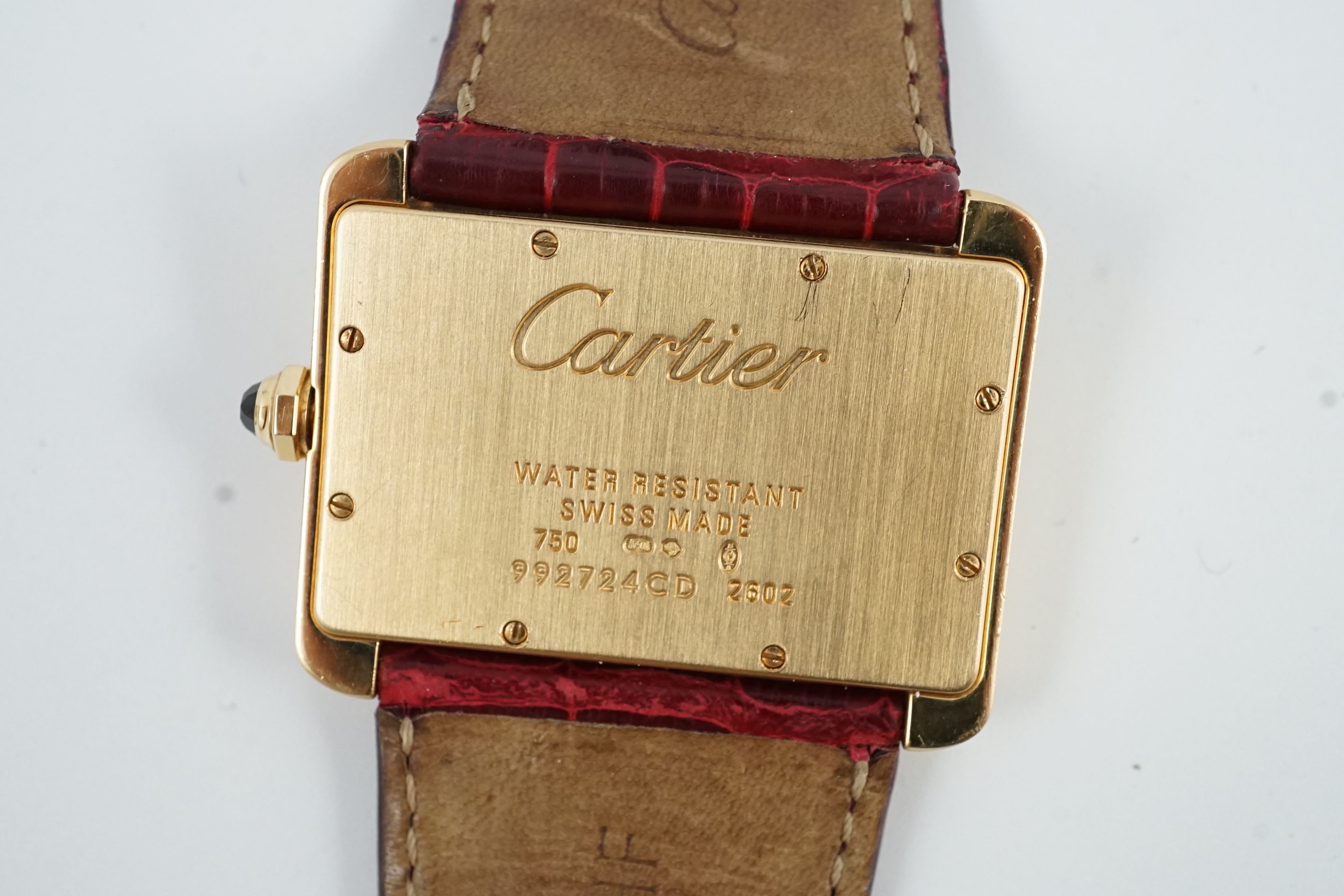 A gentleman's modern 18ct gold Cartier Tank Divan quartz wrist watch